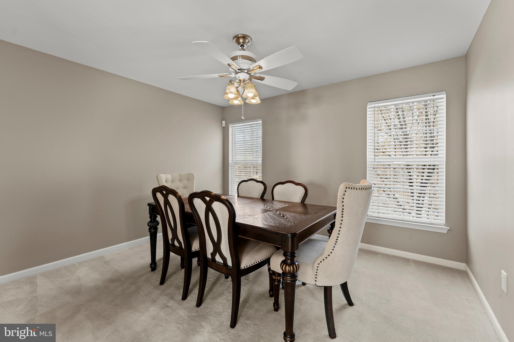 7756 Seneca Ridge Drive York, PA 17403 - Photo 10 of 50 a view of a dining room with furniture and chandelier