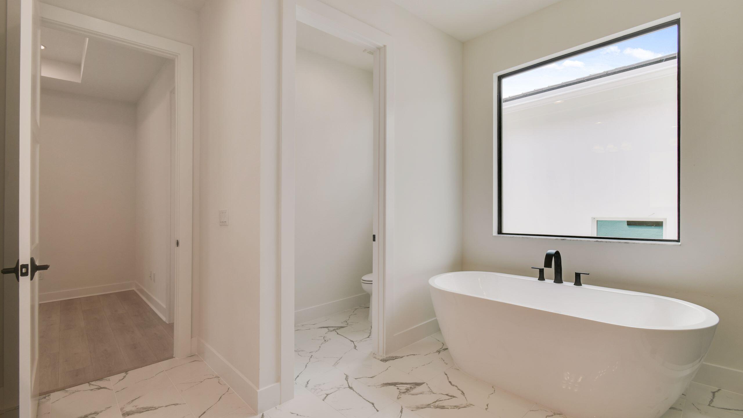 13128 Alton Road Palm Beach Gardens, FL 33418 - Photo 9 of 42 Alton_13128AltonRd_Owner'sBath2