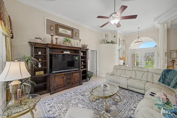 a dining room with furniture and window