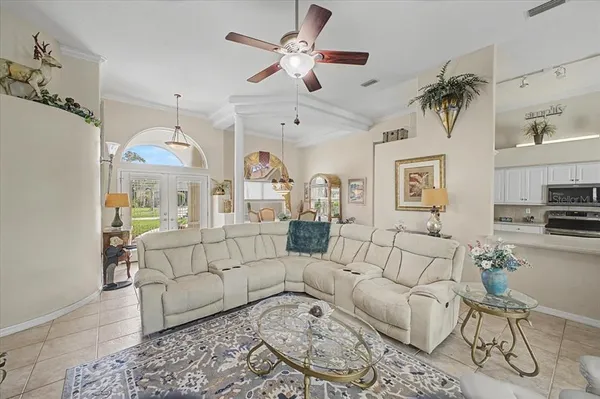 a bedroom with a bed and a mirror
