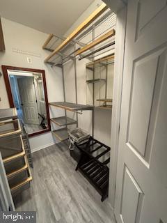 1581 Spring Gate Dr., Unit 5403 McLean, VA 22102 - Photo 12 of 16 a view of a closet with wooden floor