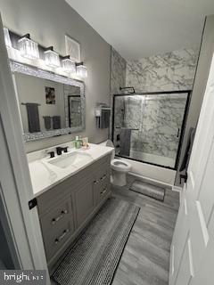 1581 Spring Gate Dr., Unit 5403 McLean, VA 22102 - Photo 14 of 16 a bathroom with a double vanity sink and mirror