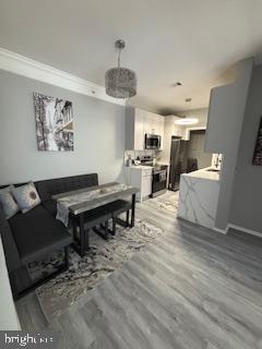 1581 Spring Gate Dr., Unit 5403 McLean, VA 22102 - Photo 2 of 16 a living room with furniture and a piano