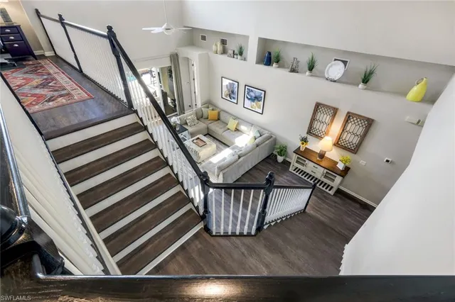a view of an entryway with wooden floor