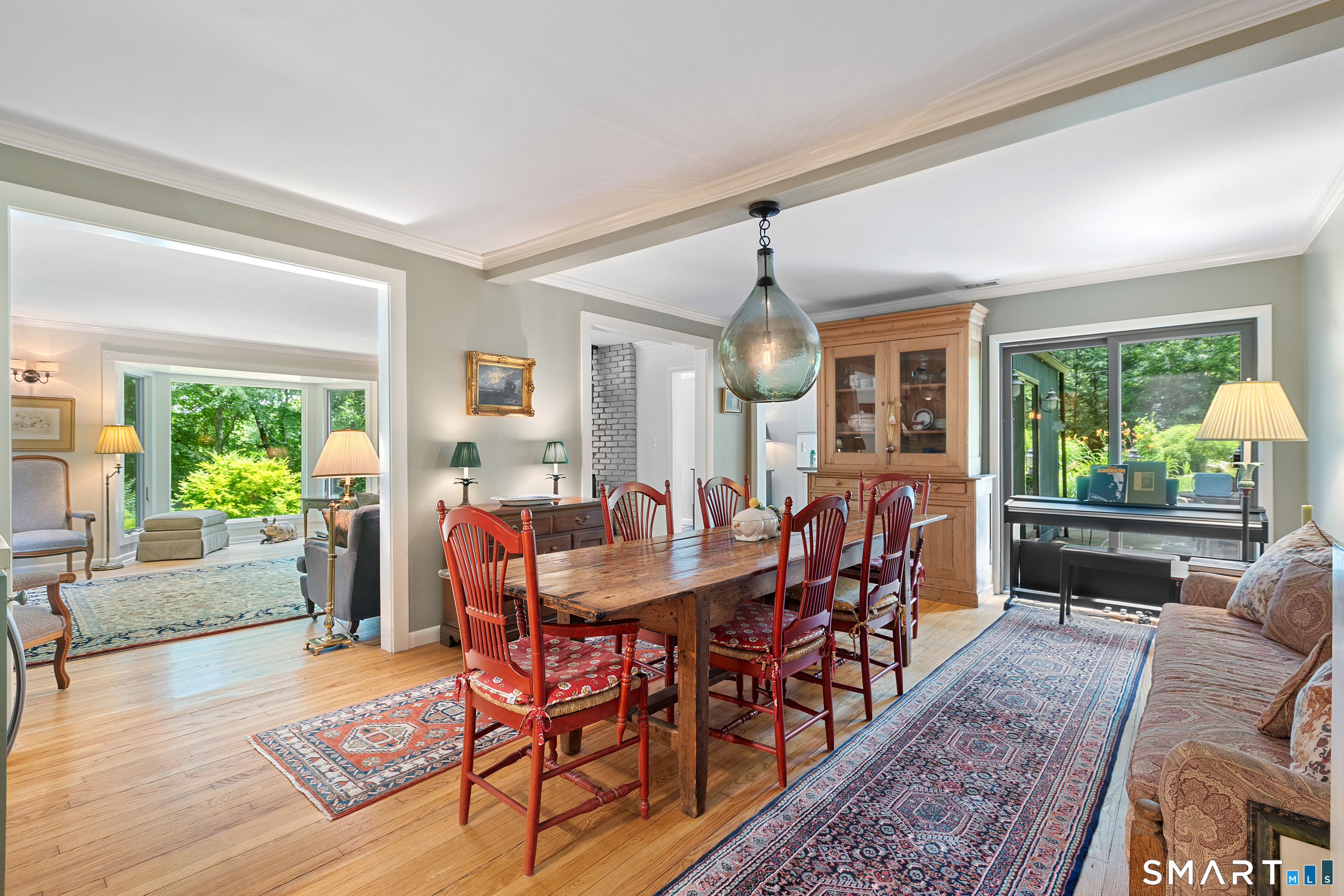 131 Georgetown Road Weston, CT 06883 - Photo 8 of 37 Dining Room with sliders overlooking stone terrace