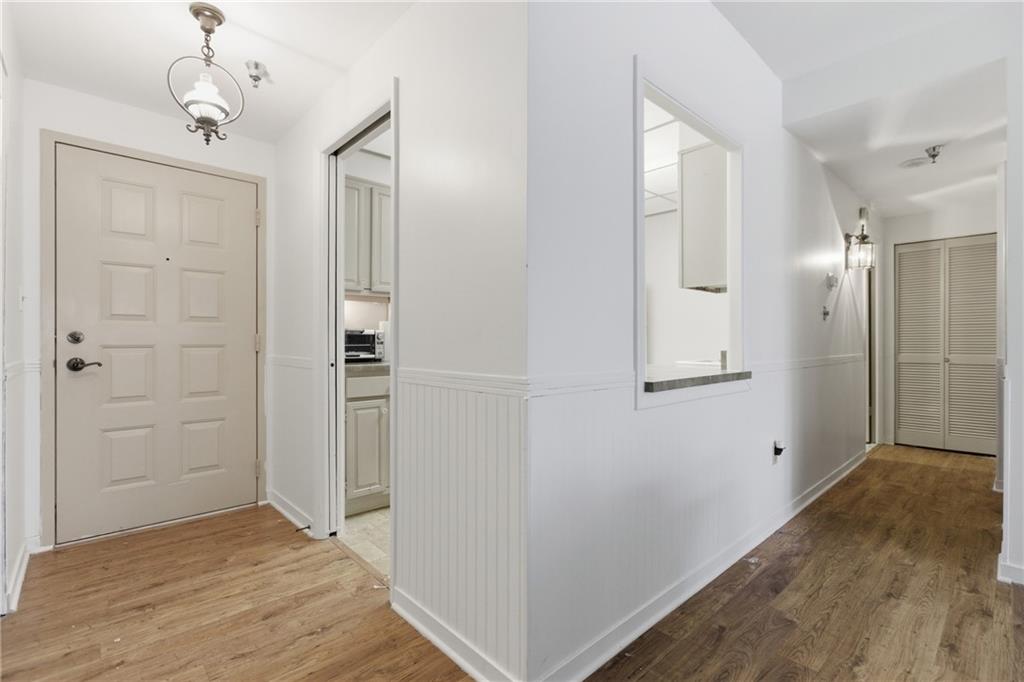 750 Washington Road, Unit 307 Pittsburgh, PA 15228 - Photo 2 of 24 a view of a hallway with wooden floor