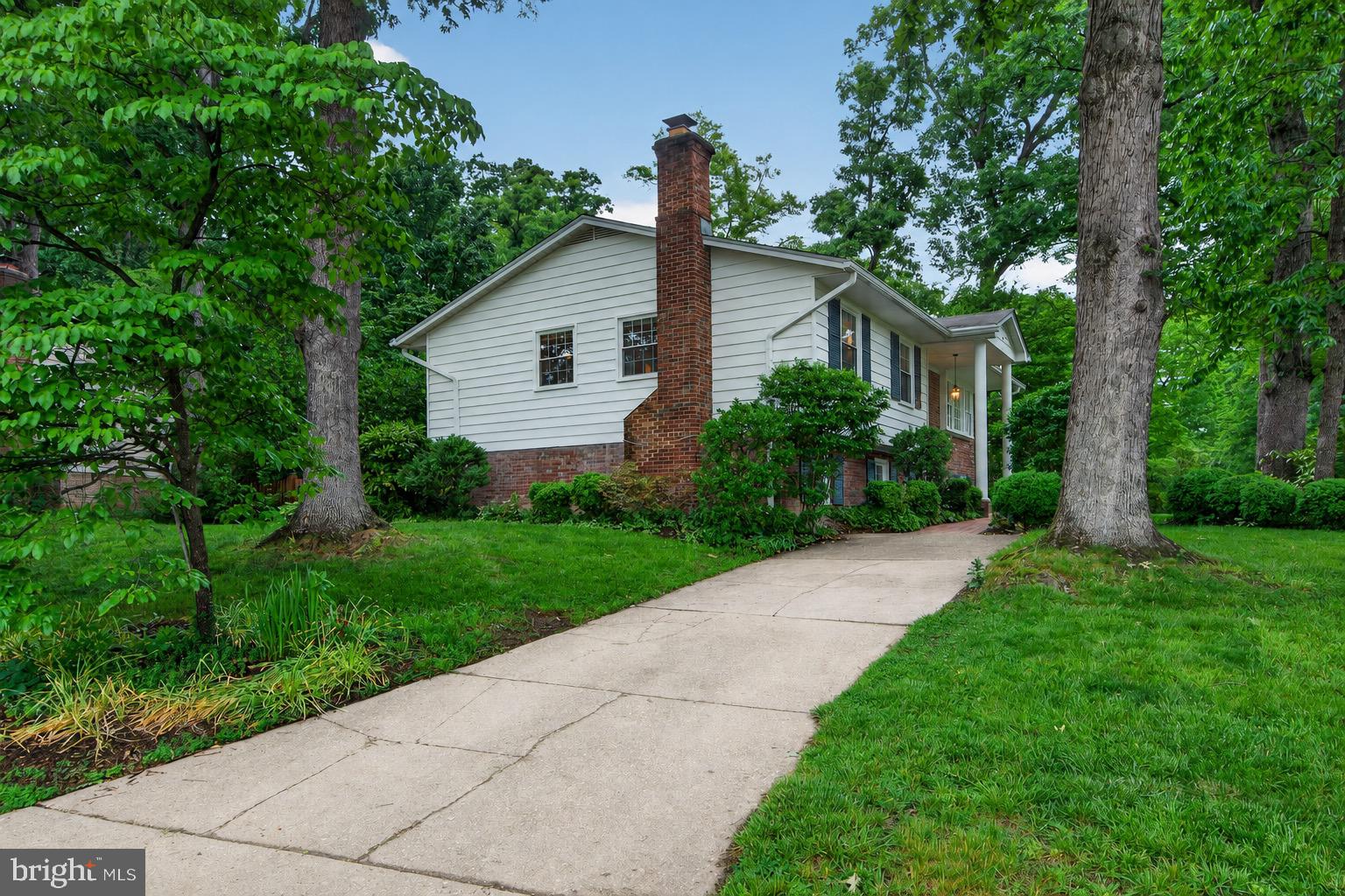 5024 Portsmouth Road Fairfax, VA 22032 - Photo 35 of 38 a front view of house with yard and green space