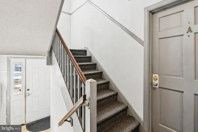 a view of an entryway with staircase