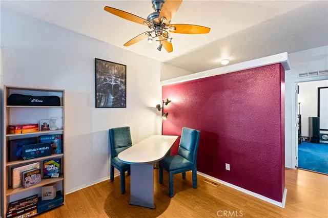 a workspace room with furniture