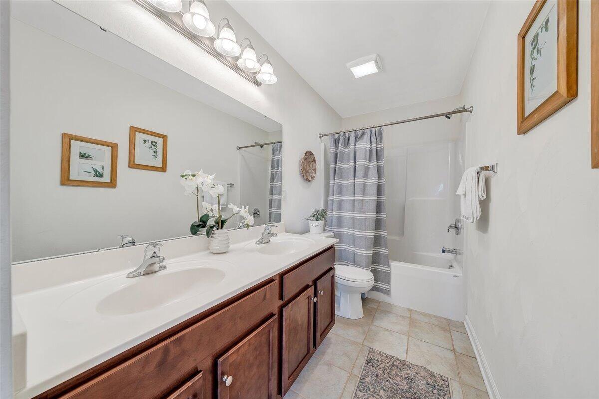 427 Cambridge Ct Road Vinton, VA 24179 - Photo 32 of 46 a bathroom with a double vanity sink mirror double and shower
