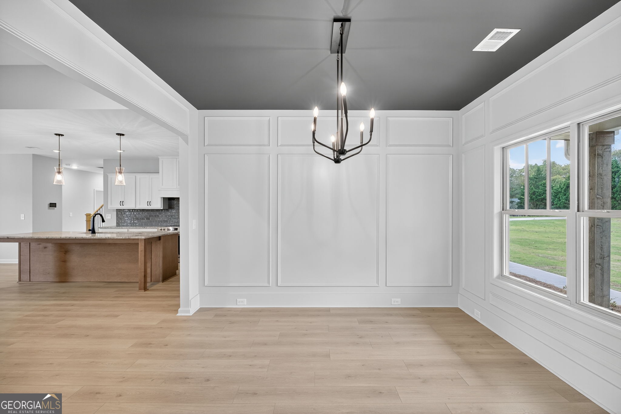 359 Gray Road Roopville, GA 30170 - Photo 11 of 46 a view of a kitchen with a sink and windows