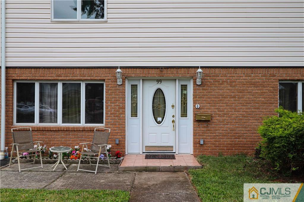 99 Ashley Road Edison, NJ 08817 - Photo 3 of 38 a front view of a house with patio