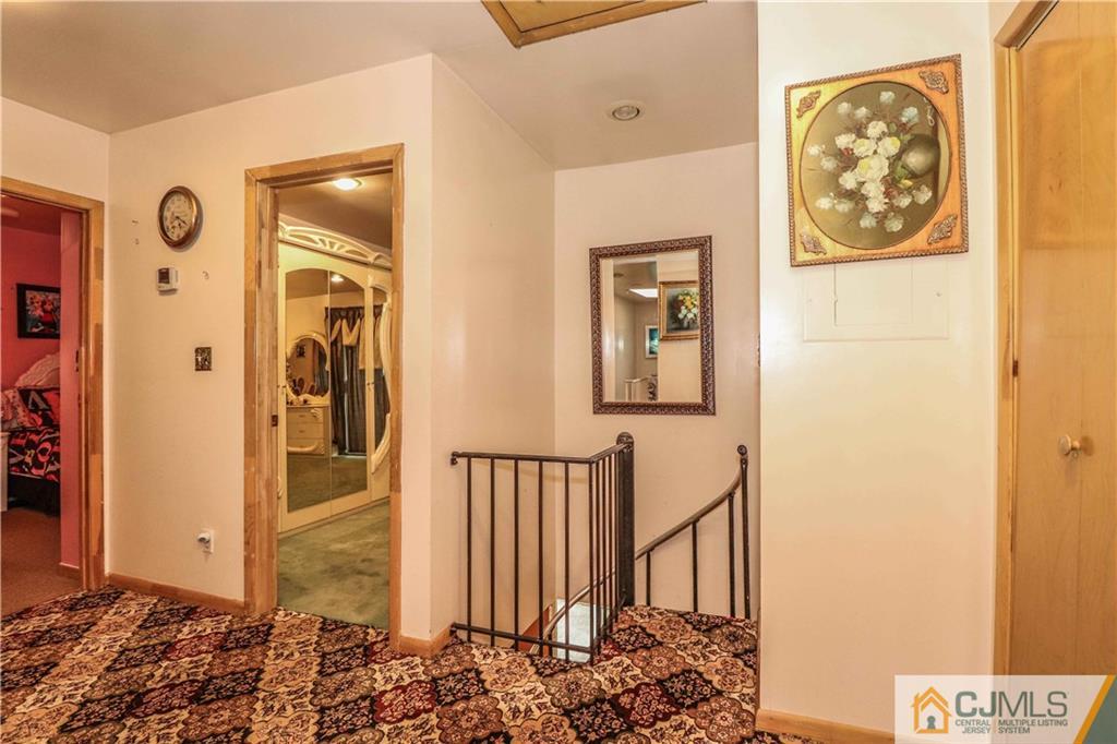 99 Ashley Road Edison, NJ 08817 - Photo 34 of 38 a view of entryway with wooden floor