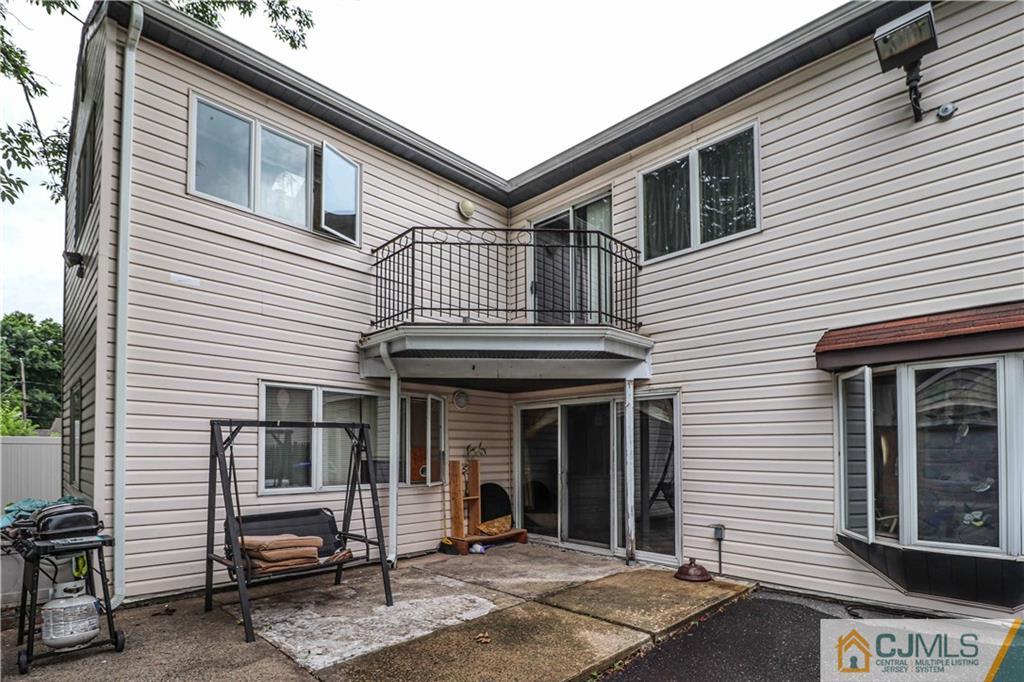 99 Ashley Road Edison, NJ 08817 - Photo 35 of 38 a front view of a house with a porch