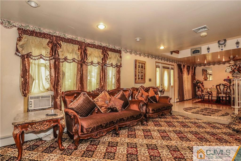 99 Ashley Road Edison, NJ 08817 - Photo 7 of 38 a living room with furniture