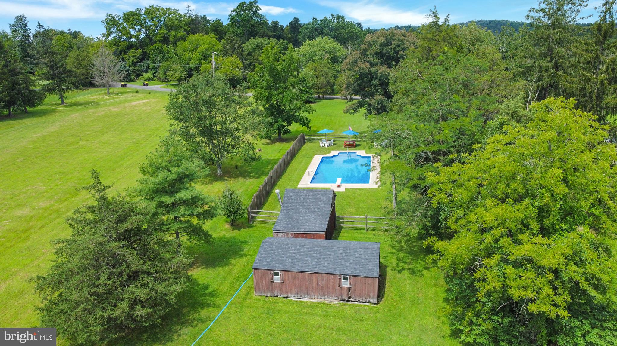 207 Hendricks Road Perkiomenville, PA 18074 - Photo 16 of 64 Yard, storage sheds, pool.