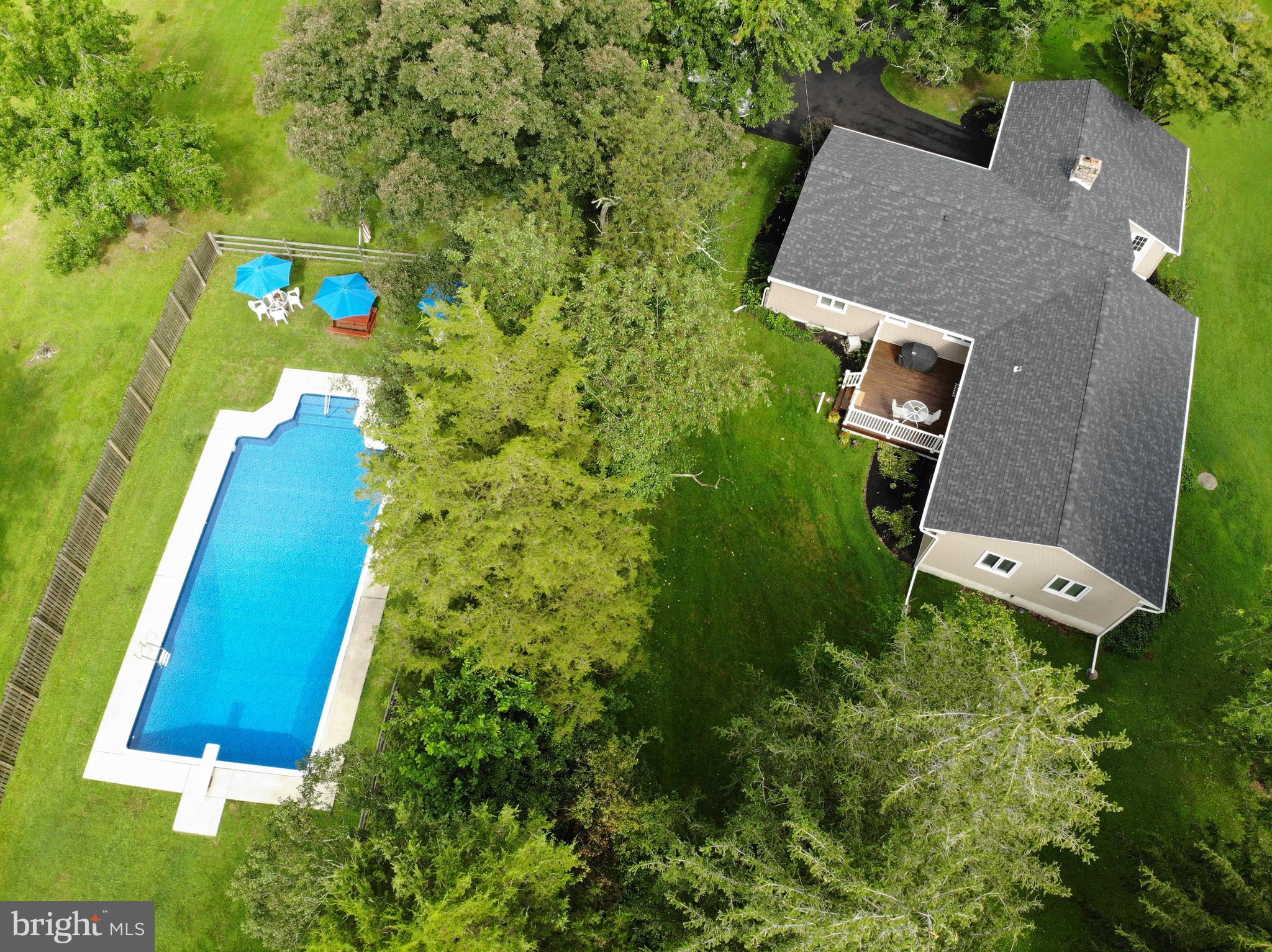 207 Hendricks Road Perkiomenville, PA 18074 - Photo 60 of 64 Pool, patio area, house.