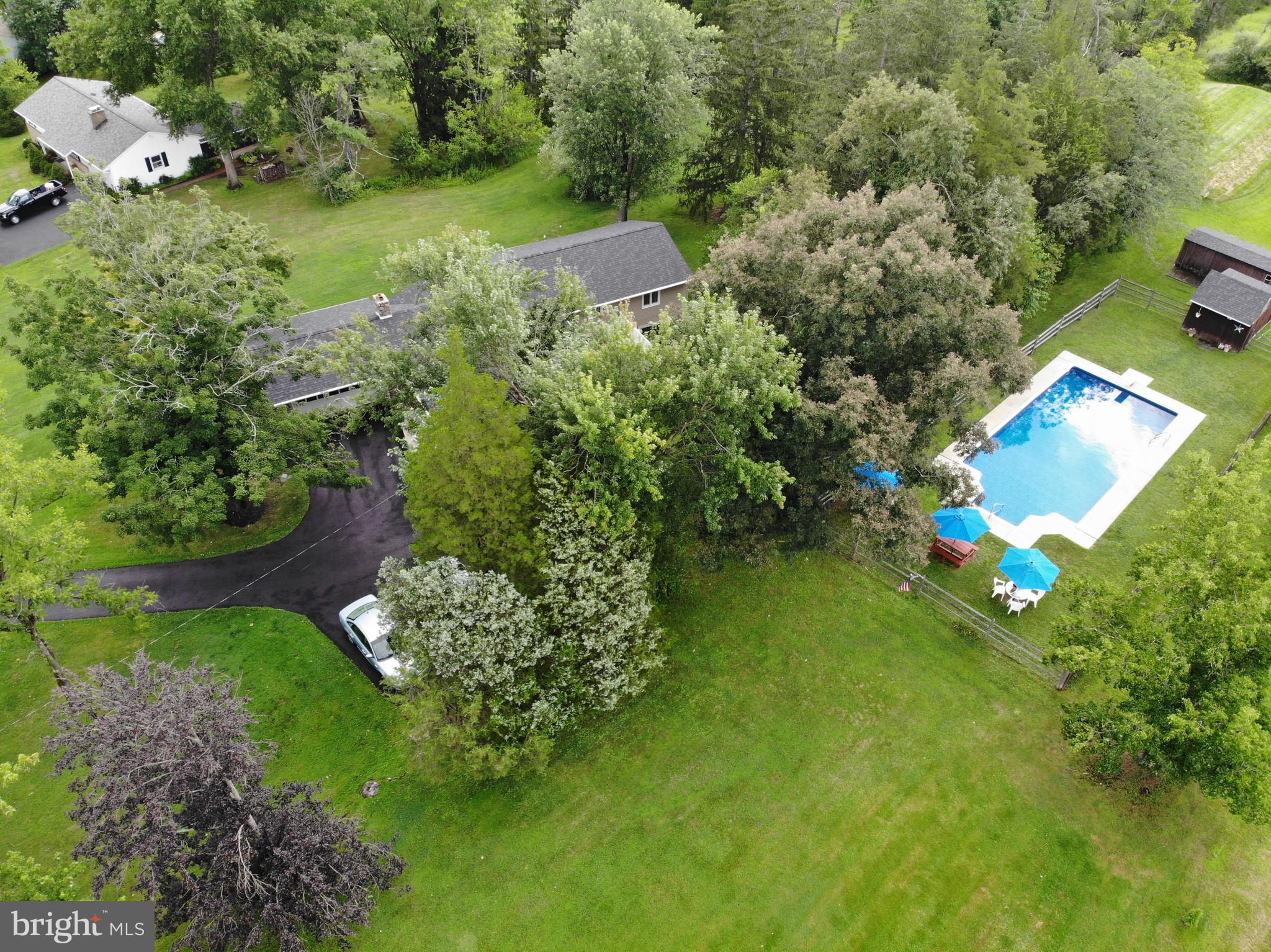 207 Hendricks Road Perkiomenville, PA 18074 - Photo 63 of 64 House, driveway, pool, storage sheds.
