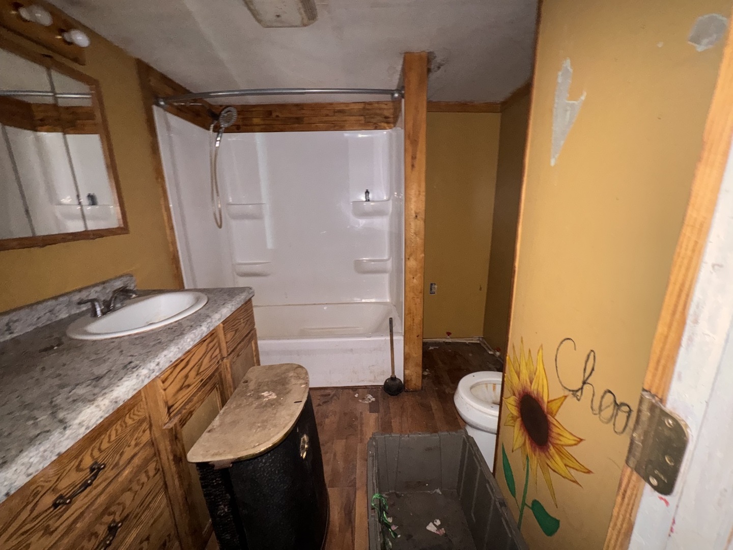 161 Wilbern Road Washburn, IL 61570 - Photo 5 of 7 a bathroom with a granite countertop sink a mirror and shower