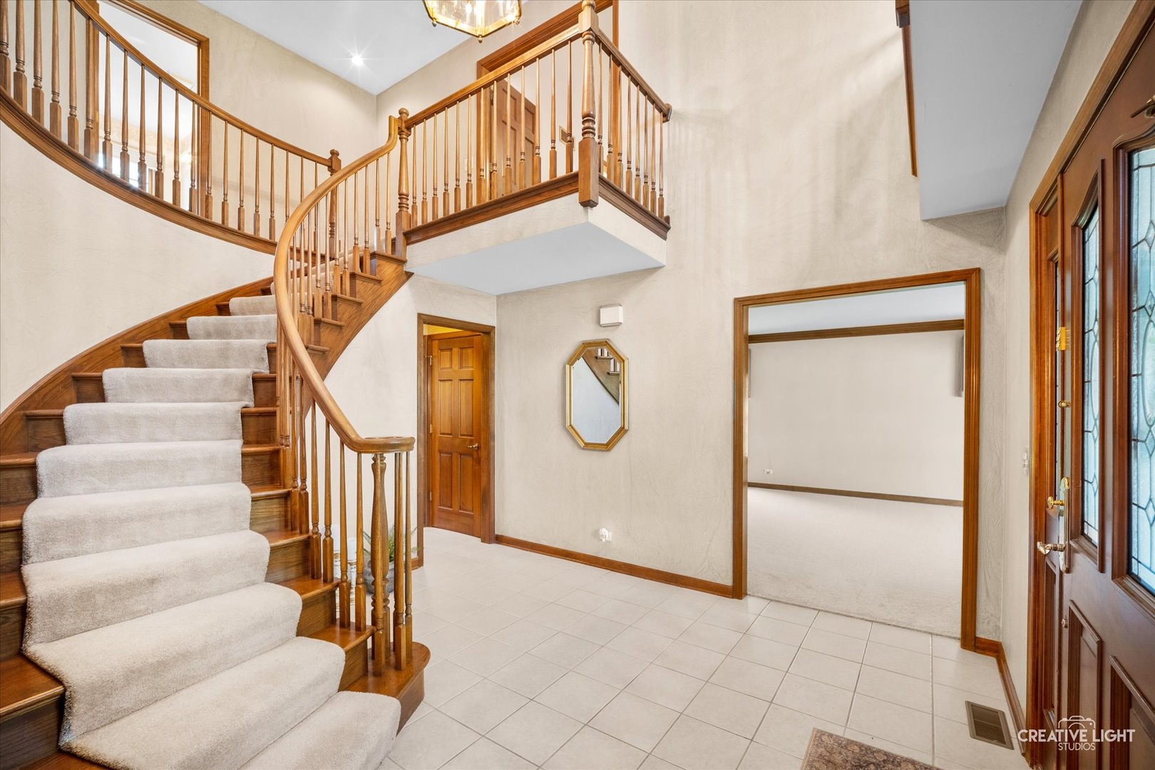 3112 Turnberry Road St. Charles, IL 60174 - Photo 4 of 43 a view of staircase with white walls and a window