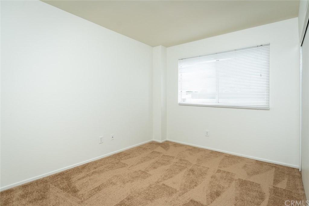 8865 Independence Avenue, Unit 26 Canoga Park, CA 91304 - Photo 13 of 40 an empty room with a window