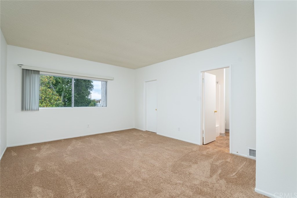 8865 Independence Avenue, Unit 26 Canoga Park, CA 91304 - Photo 21 of 40 an empty room with windows