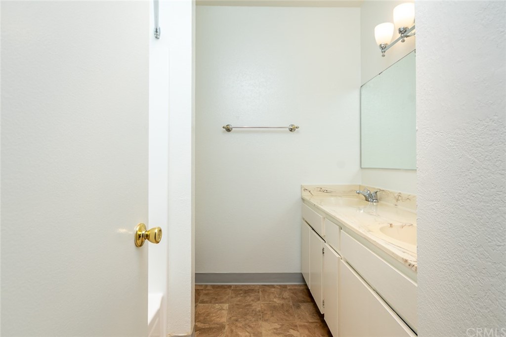 8865 Independence Avenue, Unit 26 Canoga Park, CA 91304 - Photo 25 of 40 a bathroom with a sink and a mirror