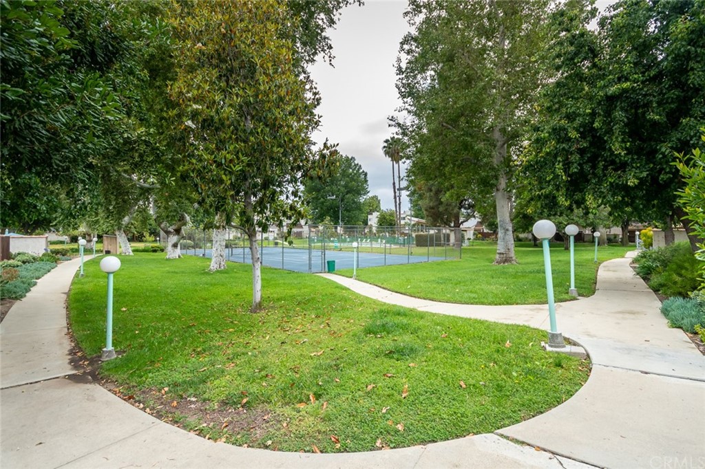 8865 Independence Avenue, Unit 26 Canoga Park, CA 91304 - Photo 34 of 40 a view of a park with large trees