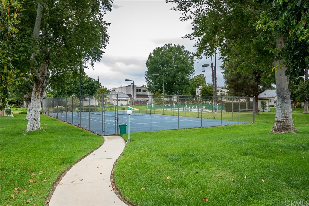 8865 Independence Avenue, Unit 26 Canoga Park, CA 91304 - Photo 35 of 40 a view of a park with a large tree