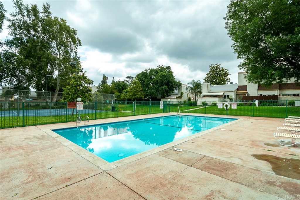 8865 Independence Avenue, Unit 26 Canoga Park, CA 91304 - Photo 37 of 40 a view of swimming pool with a yard