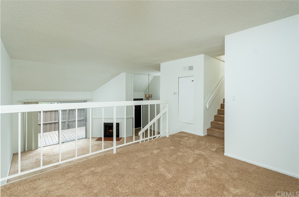 8865 Independence Avenue, Unit 26 Canoga Park, CA 91304 - Photo 4 of 40 an empty room with windows