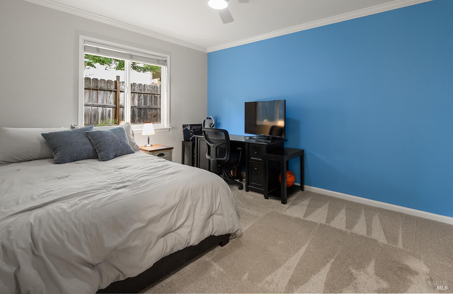 5313 Yerba Buena Road Santa Rosa, CA 95409 - Photo 16 of 34 The three secondary bedrooms are thoughtfully grouped on one side of the home, while the private primary suite is located on the opposite side, offering added privacy and functionality.
