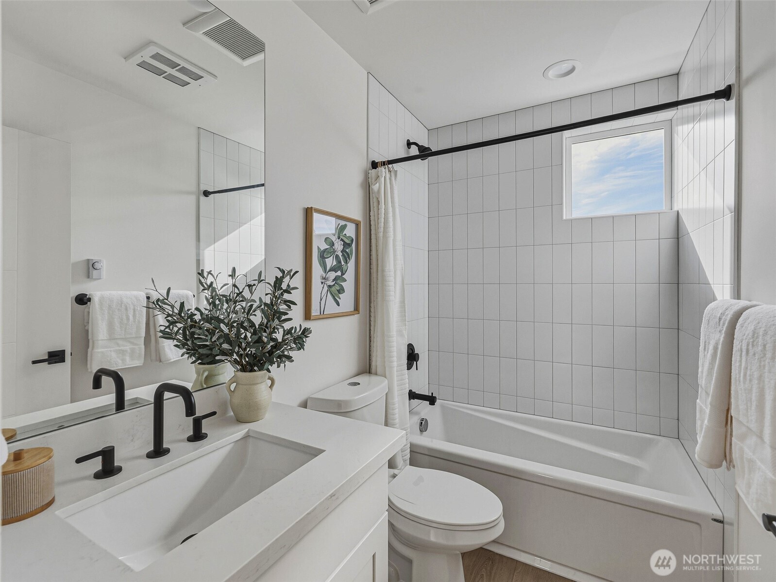 6320 41st Avenue Southwest, Unit A Seattle, WA 98136 - Photo 19 of 39 a bathroom with a sink toilet and shower