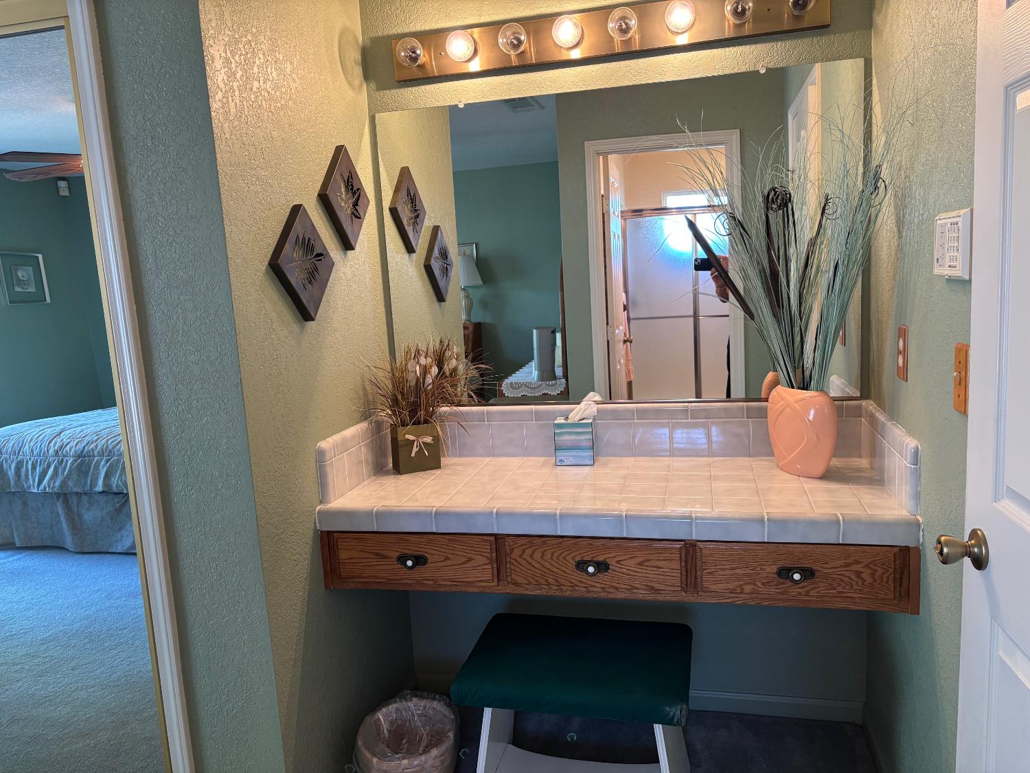 1691 Davis Street Ripon, CA 95366 - Photo 15 of 22 a bathroom with a sink and a mirror