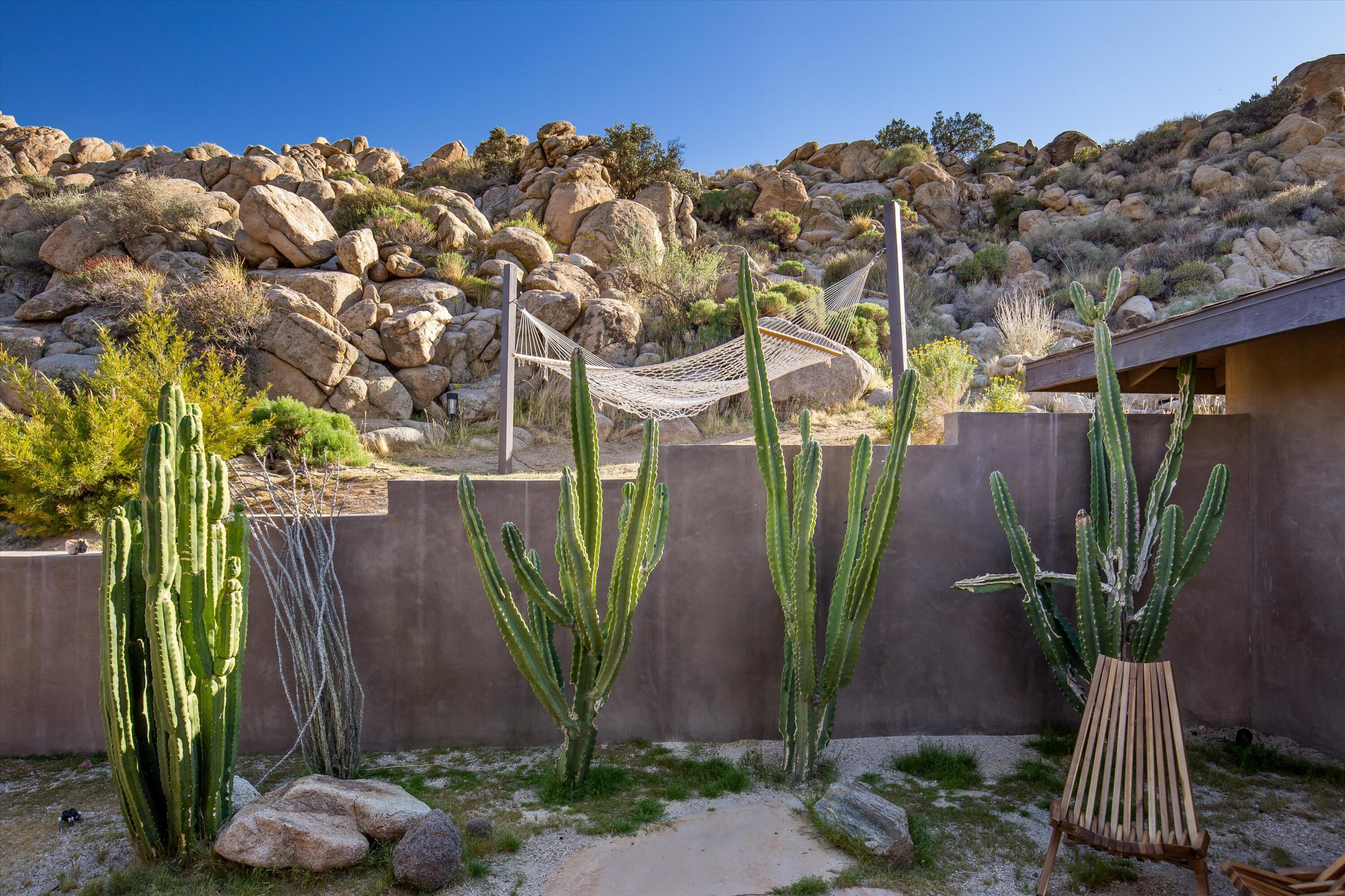 57113 Farrelo Road Yucca Valley, CA 92284 - Photo 15 of 50 a view of balcony with plants