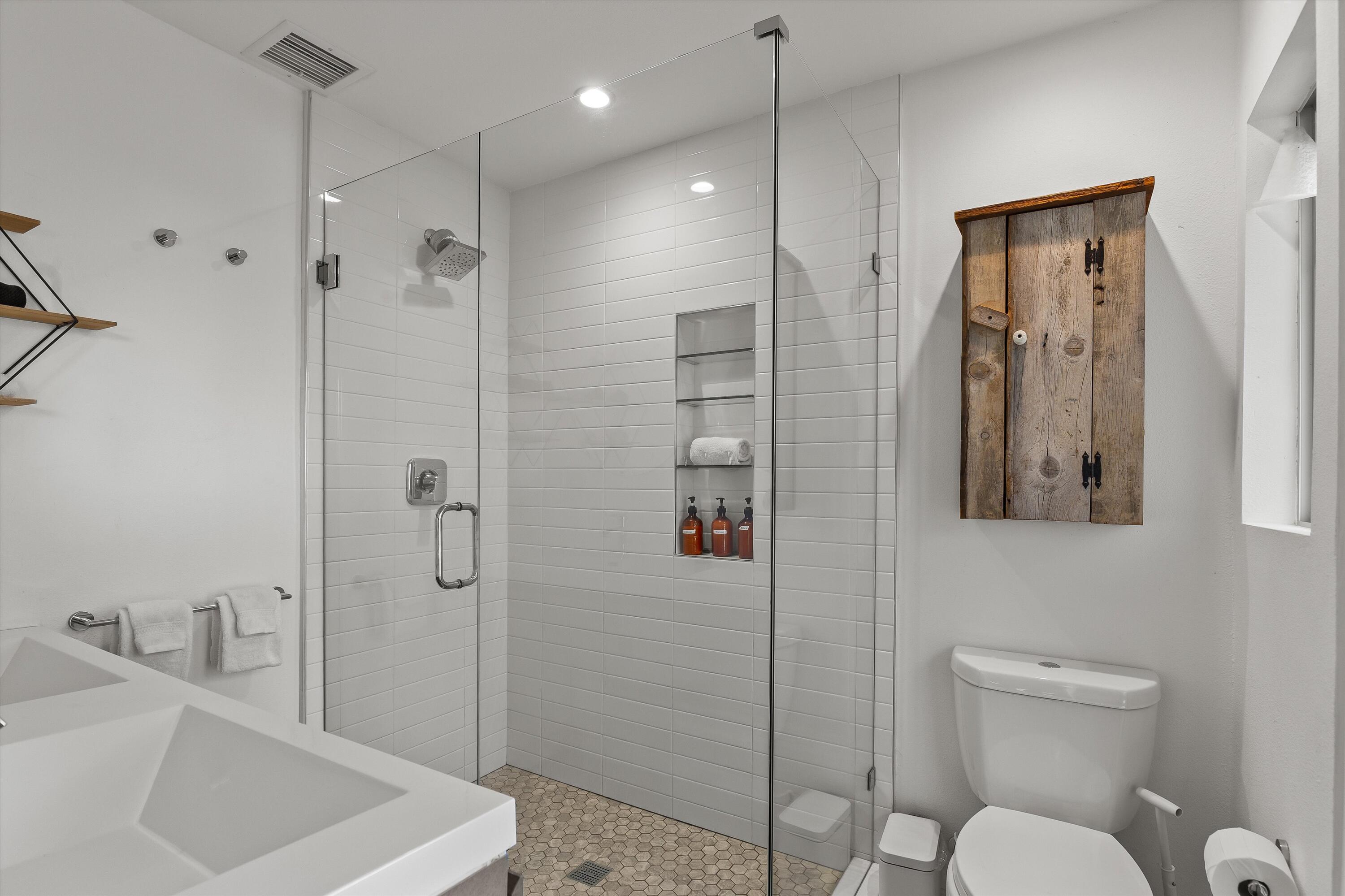 57113 Farrelo Road Yucca Valley, CA 92284 - Photo 23 of 50 a bathroom with a sink a toilet and shower