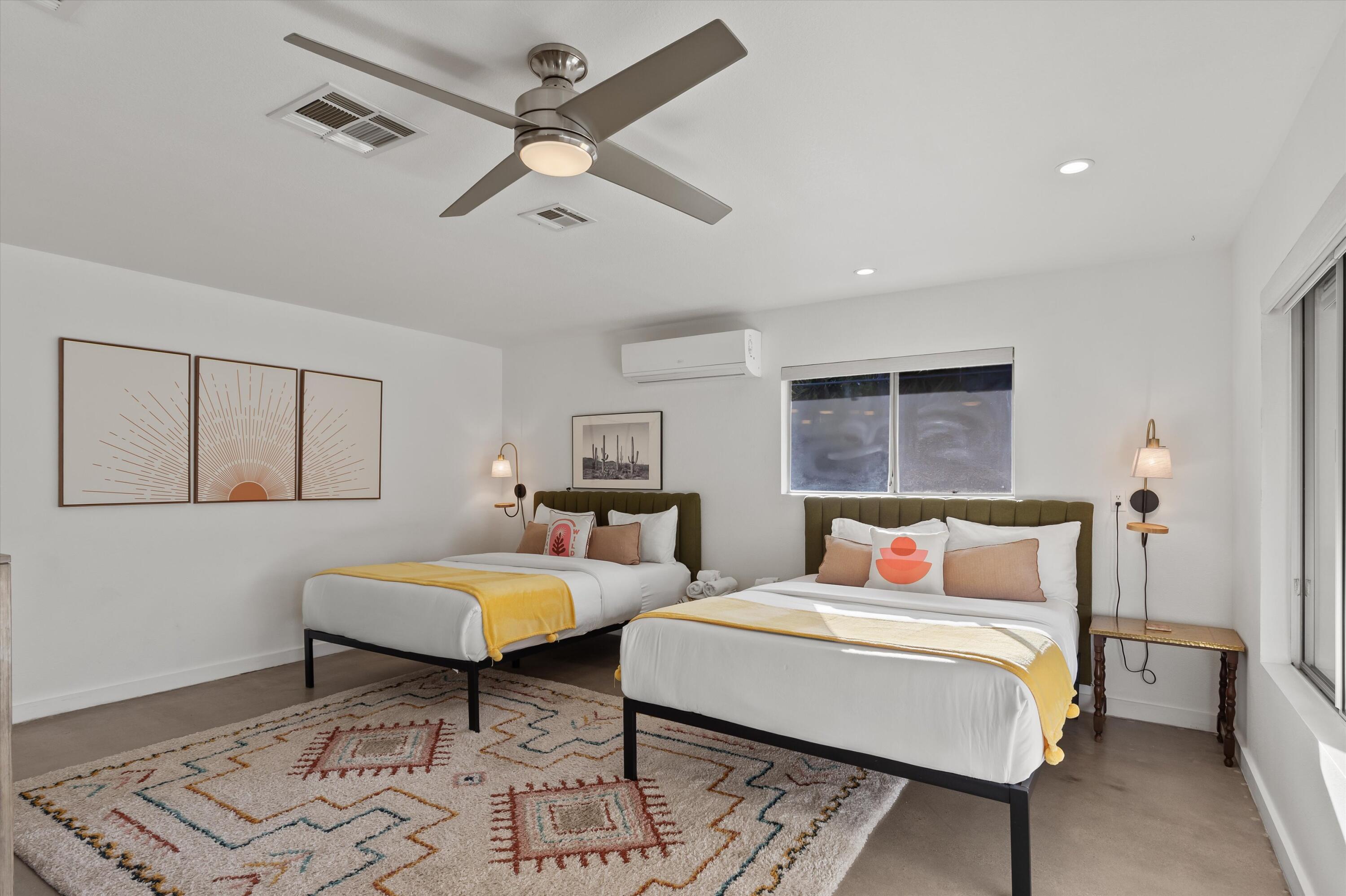 57113 Farrelo Road Yucca Valley, CA 92284 - Photo 29 of 50 a bedroom with a bed and window