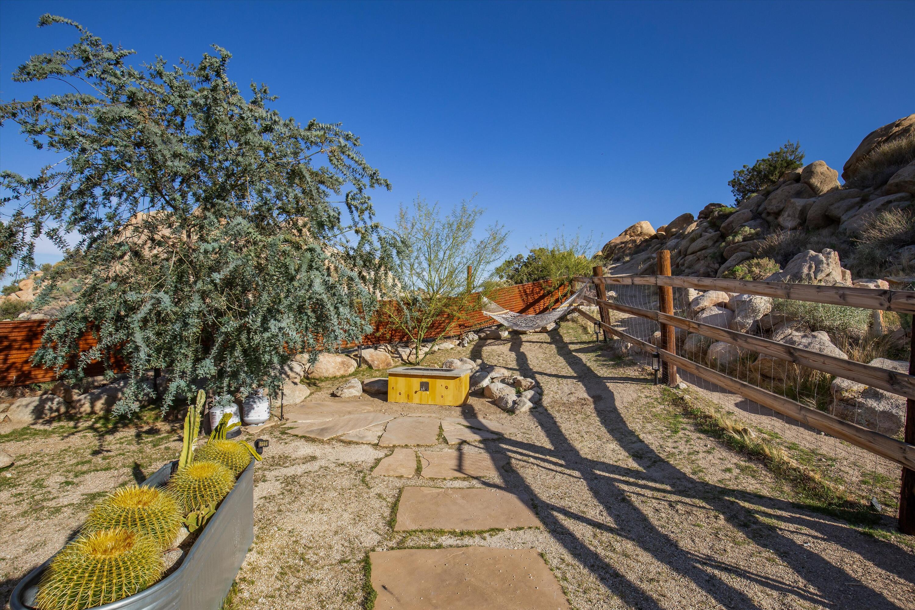57113 Farrelo Road Yucca Valley, CA 92284 - Photo 31 of 50 a view of a yard