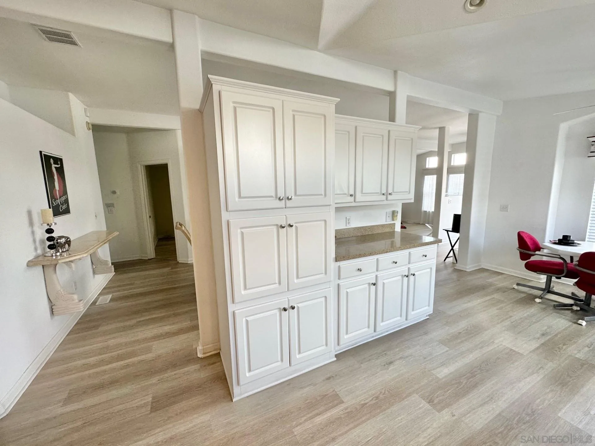 13307 Alpine Drive, Unit 2 Poway, CA 92064 - Photo 6 of 13 a large white room with mirror on the wall and glass door