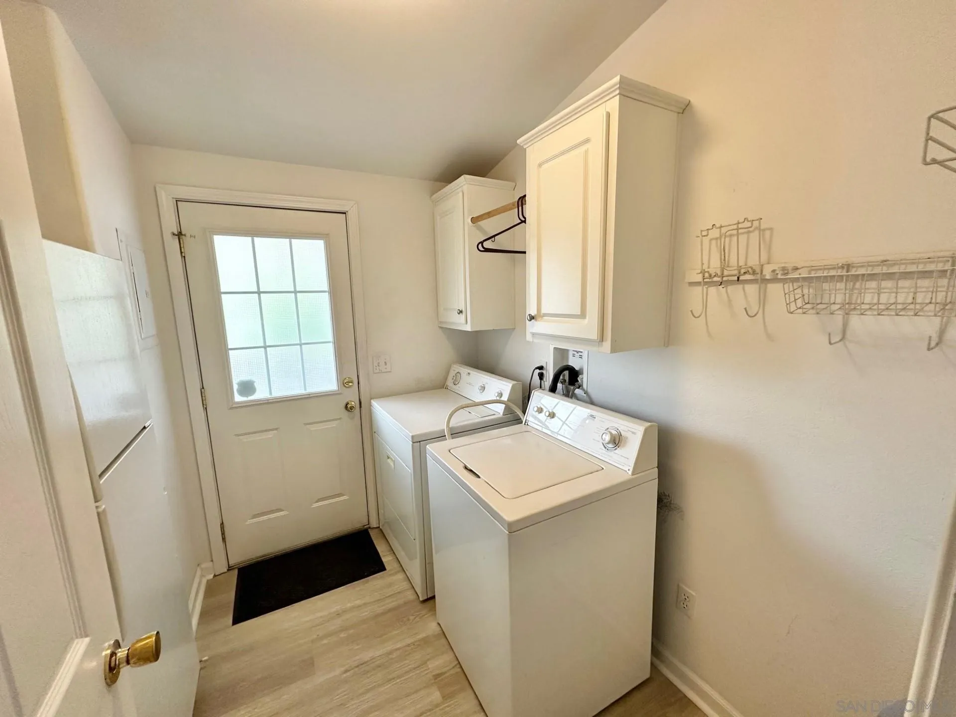 13307 Alpine Drive, Unit 2 Poway, CA 92064 - Photo 10 of 13 a bathroom with a sink a toilet and a mirror