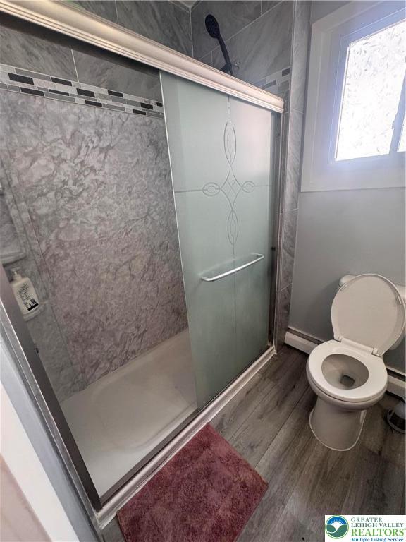 1104 South 7th Street Allentown, PA 18103 - Photo 18 of 27 a bathroom with a toilet and a shower