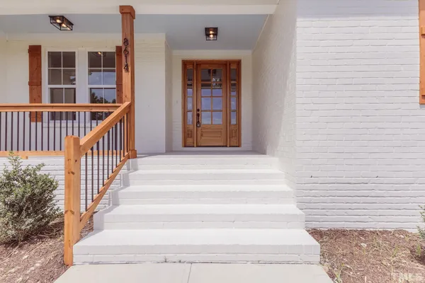 a view of entryway with a front door