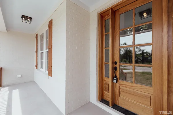 a view of front door and bedroom
