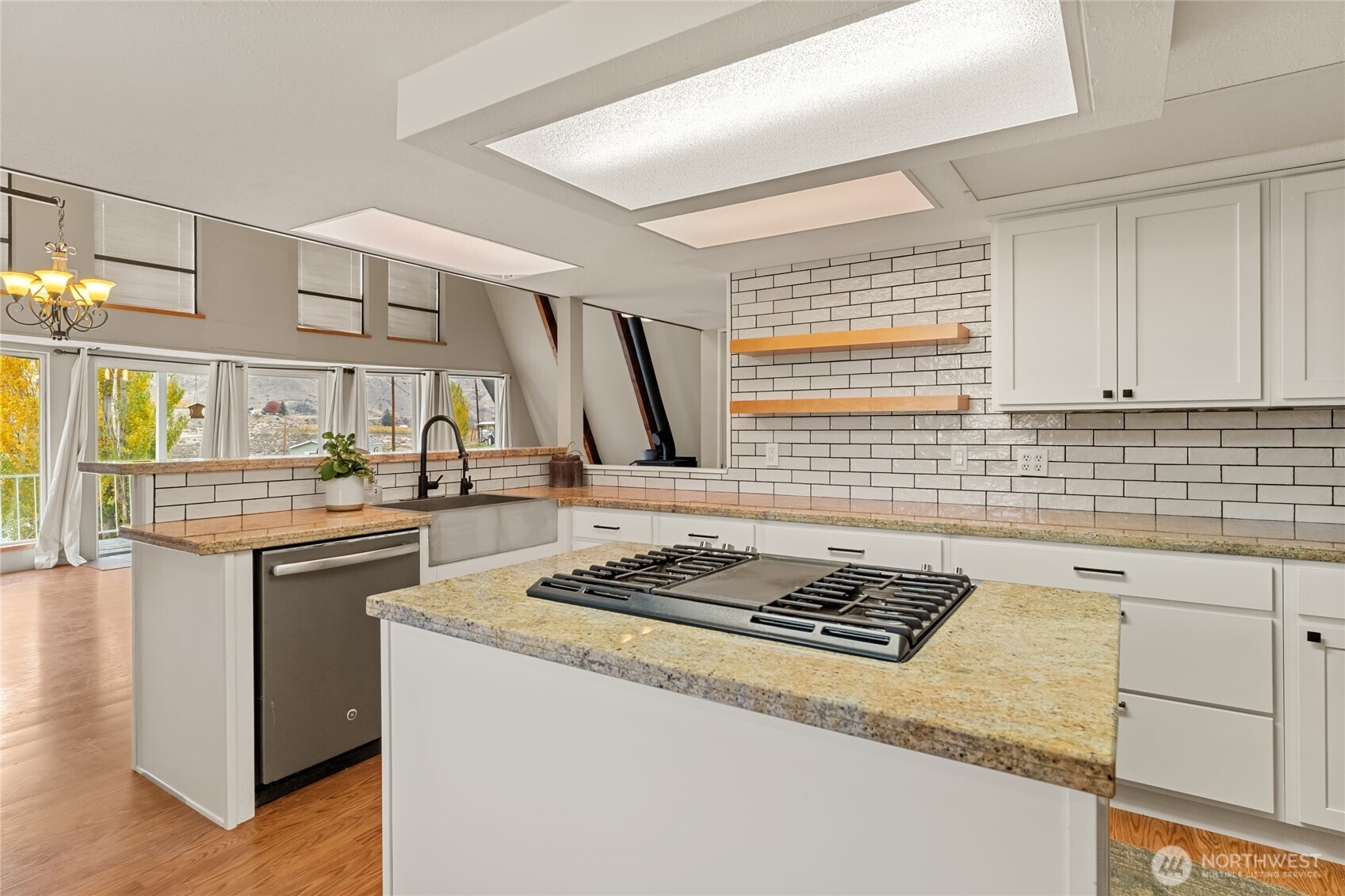 110 Bill Shaw Road Pateros, WA 98846 - Photo 14 of 39 a kitchen with stainless steel appliances granite countertop a sink stove and cabinets