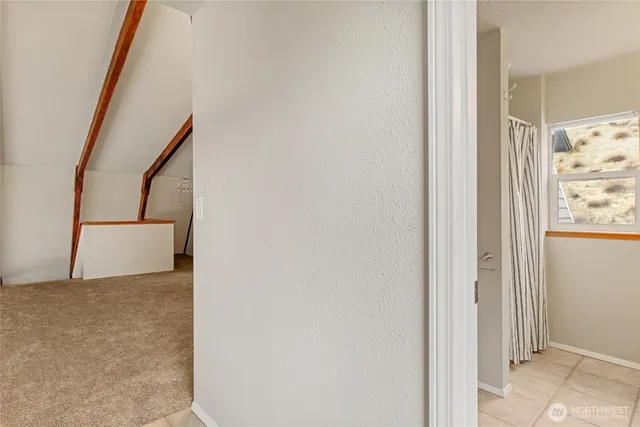 a view of a livingroom with a large window