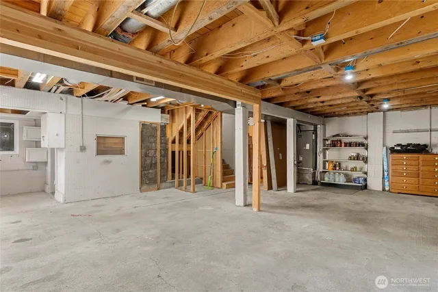 a view of a house with a patio and a yard