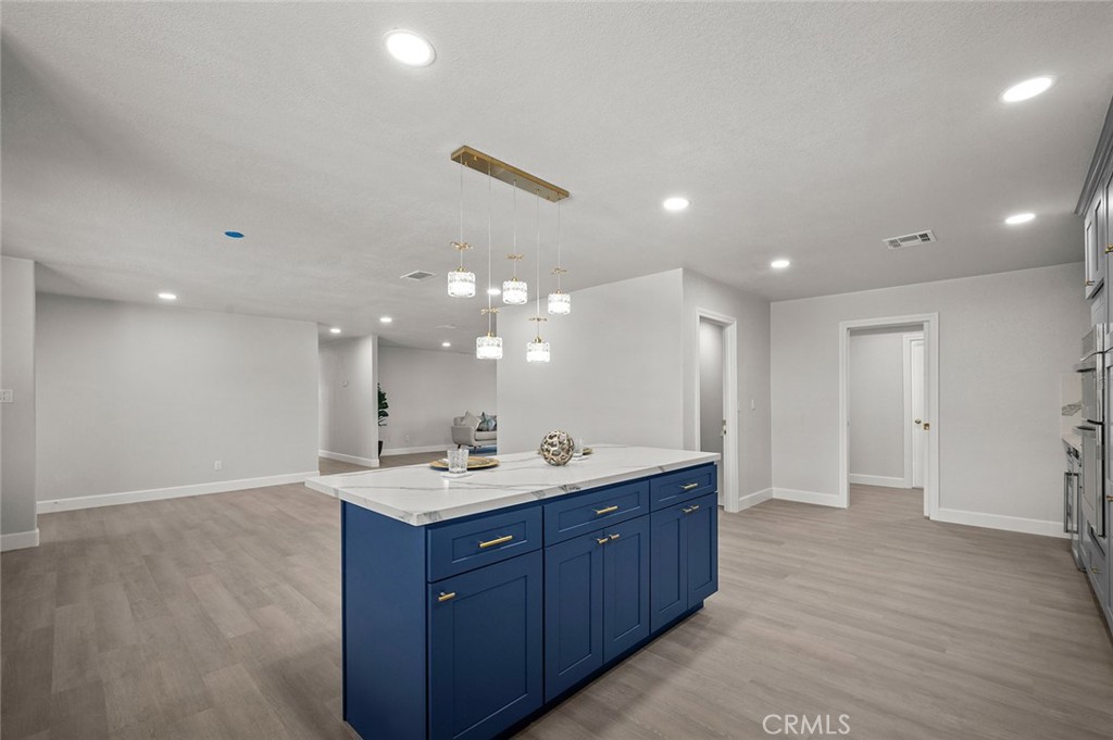 27875 Goetz Road Menifee, CA 92587 - Photo 15 of 74 a bathroom with a double vanity sink and a mirror