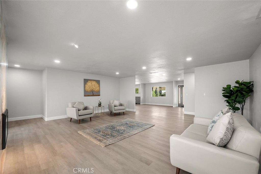 27875 Goetz Road Menifee, CA 92587 - Photo 21 of 74 a living room with furniture and a couch