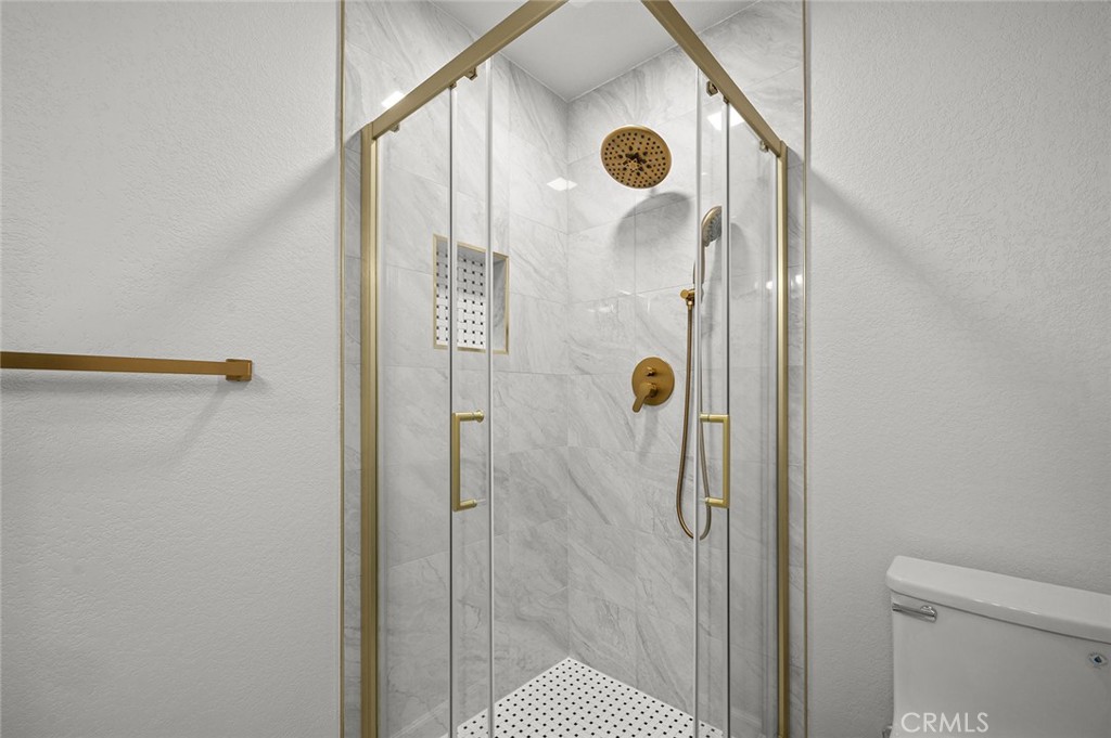 27875 Goetz Road Menifee, CA 92587 - Photo 47 of 74 a bathroom with a shower