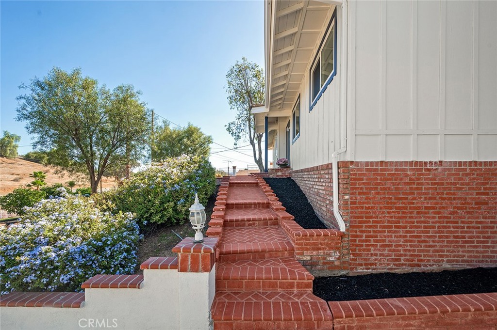 27875 Goetz Road Menifee, CA 92587 - Photo 6 of 74 a view of a pathway both side of building